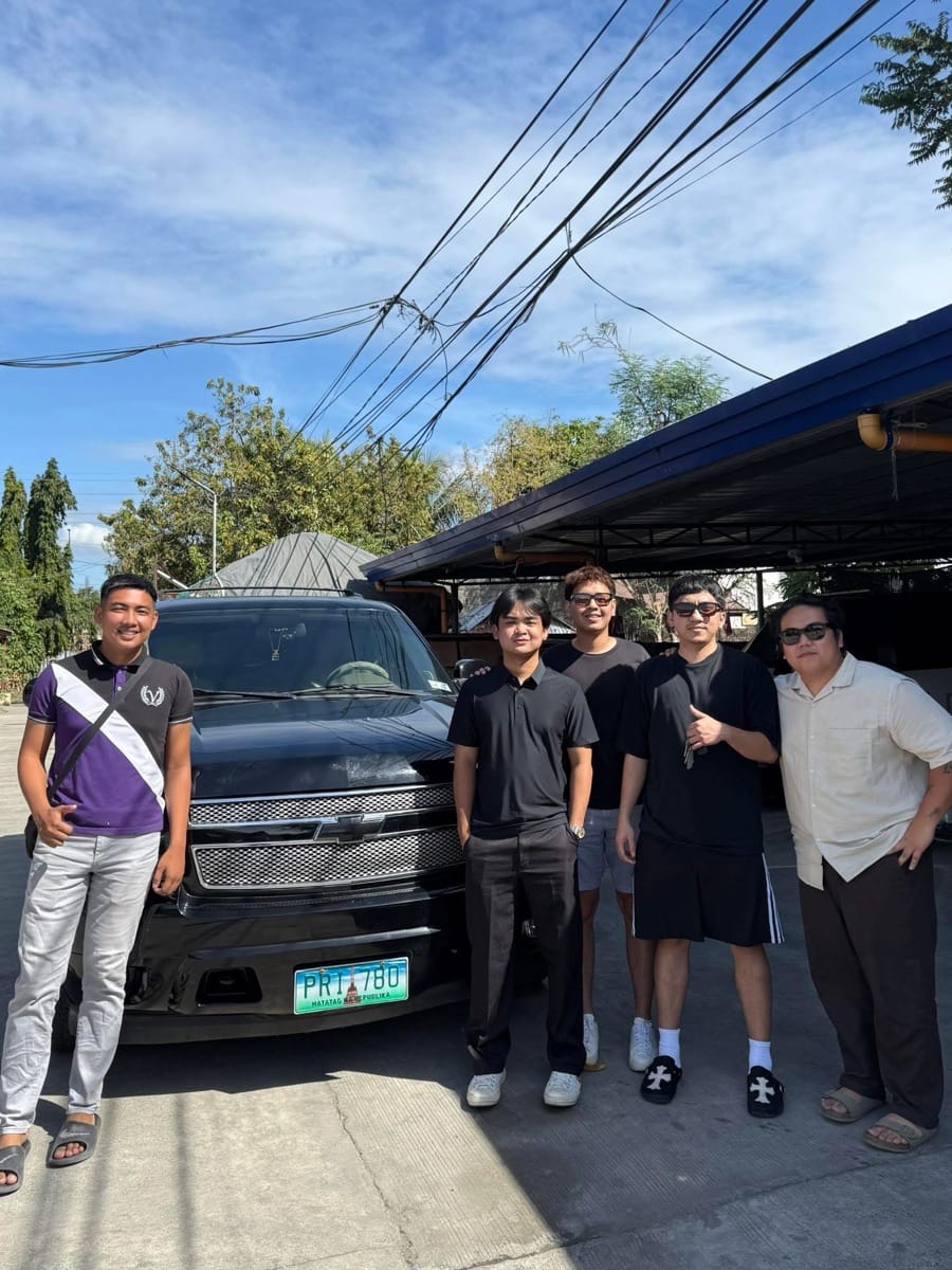 Group of buyers with their Chevrolet at the handoff